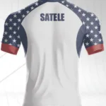 Back view of the white USA Hawks replica jersey with stars-and-stripes shoulders and a player’s surname printed across the top